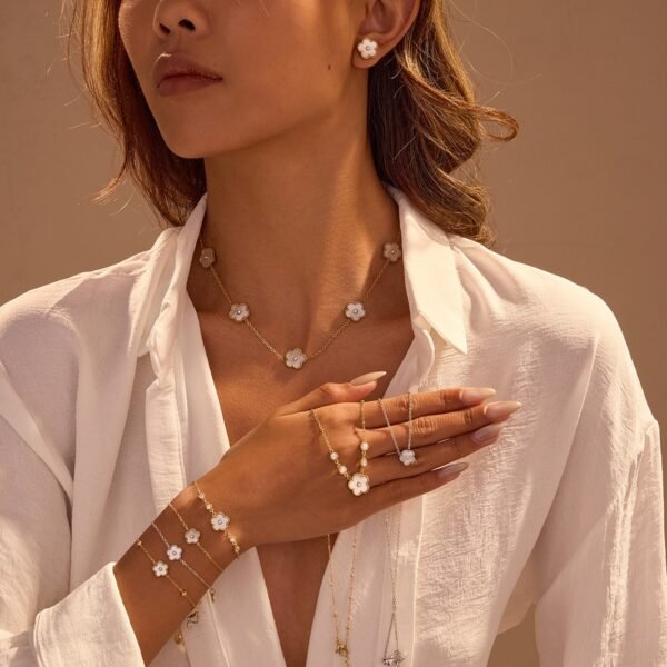 Five-flower titanium steel plum blossom necklace, bracelet and stud earrings